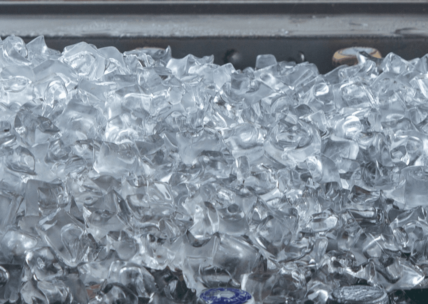 A photo of a pile of ice cubes, possibly used for cooling or ice bath therapy.