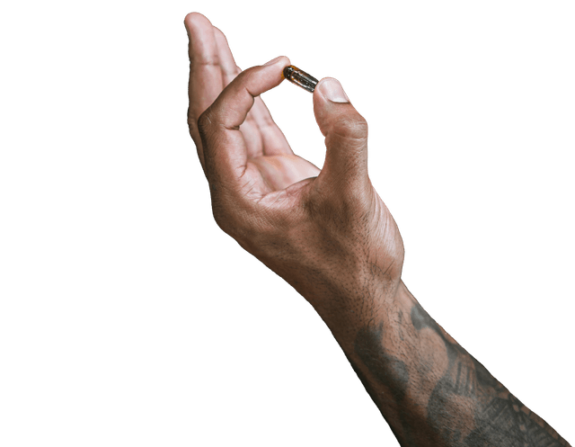 photo of a hand holding a fish oil pill with the arm extended outward